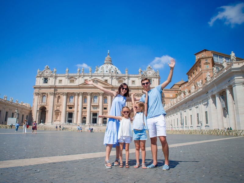 Family posing at St. Peter's Basilica